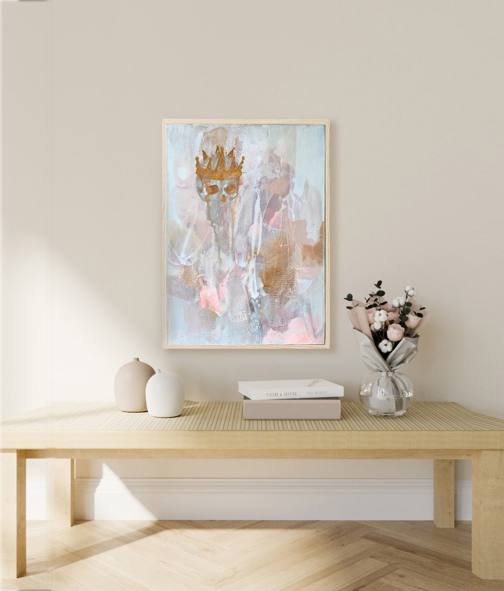 Neutral warm color palette for living room. Painting is abstract with a gold skull. 